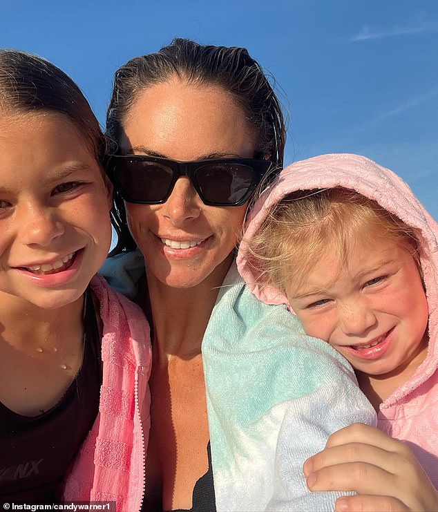 The wife of Australian cricket captain David Warner took to her social media on Monday to share some sweet photos of herself and her two daughters on the beach.