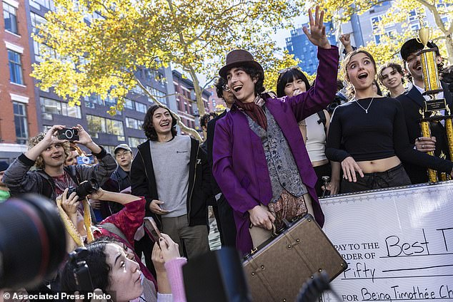 Miles Mitchell, a Staten Island College senior, was ultimately crowned the winner and tossed candy from a briefcase while wearing a purple Willy Wonka suit in his victory.