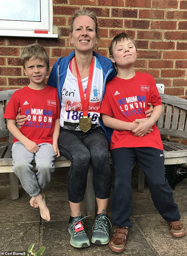 Ceri, who has completed the London Marathon four times, said she developed a specialized training regime for her son. (Pictured from left to right: Lloyd's brother, Finlay, Ceri and Lloyd)