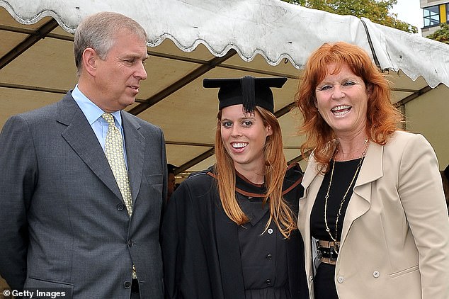 Beatrice smiling with her parents on her graduation day from Goldsmiths College in 2011.