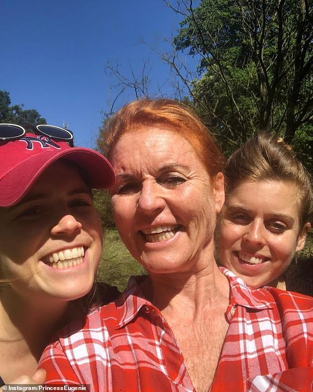 Eugenie, Sarah and Beatrice posing and smiling together for a photo in the sun