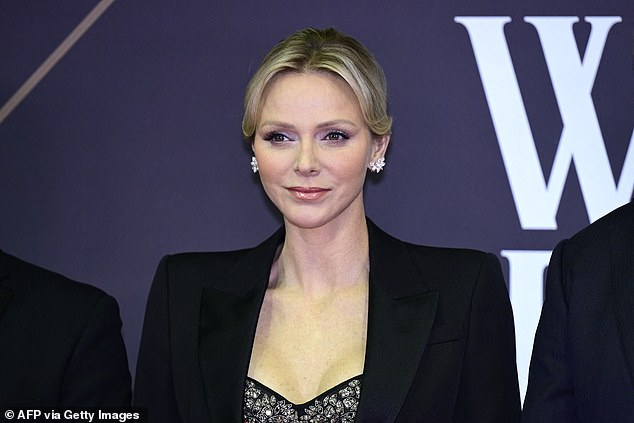 The former Olympic swimmer, 46, looked sensational as she posed up a storm on the red carpet at the Sporting Monte-Carlo complex.