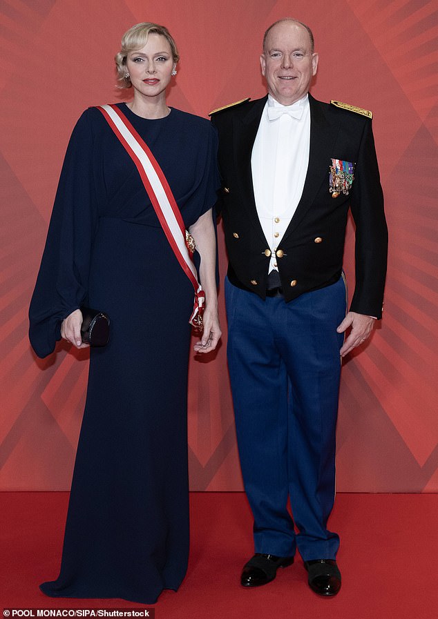 Charlene looked sensational in a floor-length long-sleeved dress, which she accessorized with a matching blue clutch as she arrived at the Grimaldi Forum in Monte Carlo.