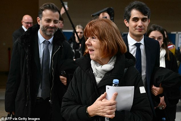 Gisele Pelicot (center) with her lawyers Antoine Camus (left) and Stéphane Babonneau (right) leave the Avignon court during the trial, November 20.