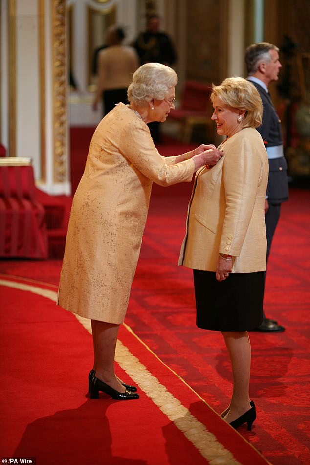 Barbara Taylor Bradford receives an OBE from The Queen at Buckingham Palace, 2007