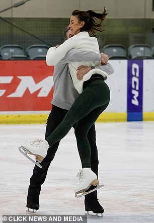 Professional Brendyn was seen lifting it into the air at one point as she moved gracefully across the ice.