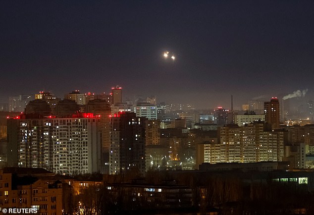 Explosions are seen in the sky above the city during a Russian drone strike, amid Russia's attack on Ukraine, in kyiv, Ukraine, Nov. 25, 2024.