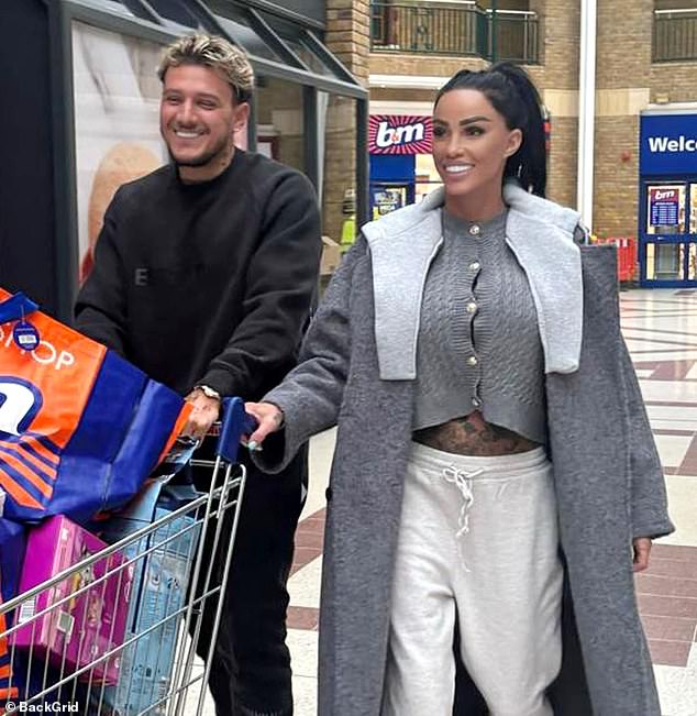 Katie and JJ were all smiles as they spent time shopping together.