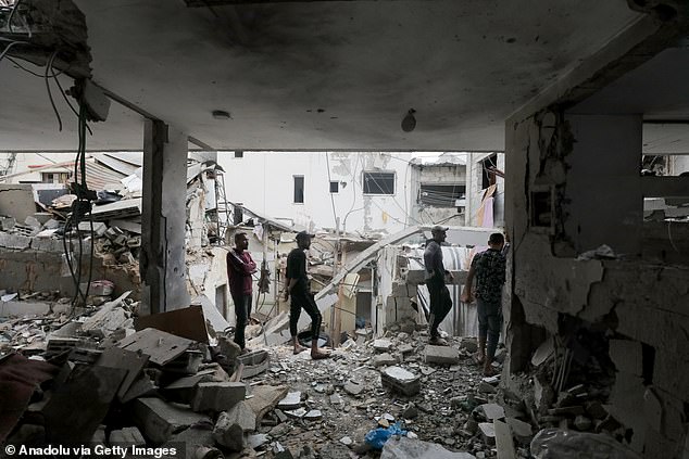 A view of the destruction after the Israeli airstrike on a building in the Nuseirat camp in the Gaza Strip on November 24, 2024.