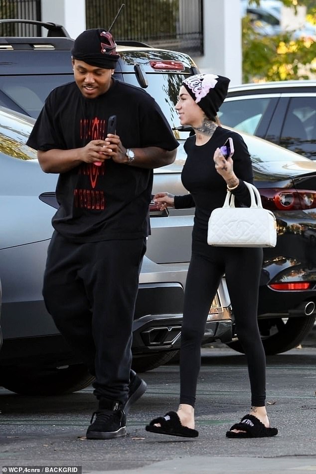 As the couple walked back to their car, Bhabie looked noticeably slimmer while standing close to her dad, 26, while wearing an all-black suit.