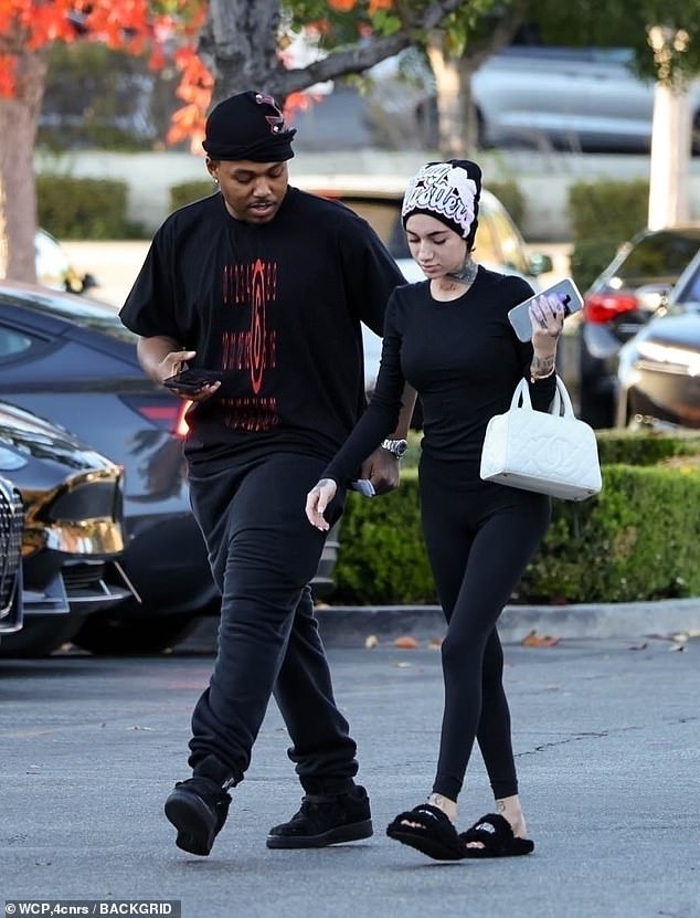 Just two weeks after explaining on Instagram that her sudden weight loss was due to her 'cancer medicine,' the artist, 21, (born Danielle Bregoli) headed out for an early dinner at SugarFish in Calabasas with her boyfriend Le Vaughan.