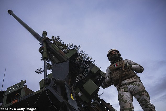 French soldiers from the 93rd Mountain Artillery Regiment operate the CAESAR, a French self-propelled howitzer that can fire NATO standard 39/52 caliber, during the Dynamic Front