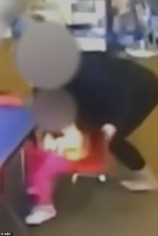 The unknown employee was filmed pulling the child and making her sit in a chair