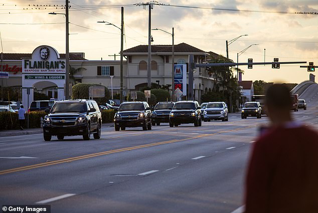 A convoy of vehicles heads toward President-elect Donald Trump's Mar-a-Lago resort on November 24, 2024 in Palm Beach, Florida.