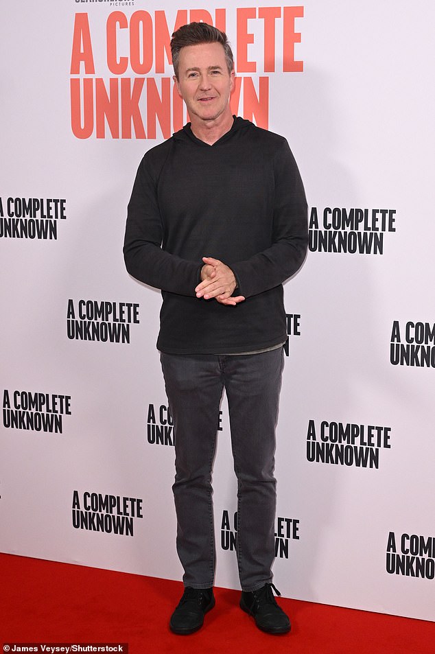 The Fight Club star donned a thin, dark hoodie, which he layered over a light gray T-shirt.