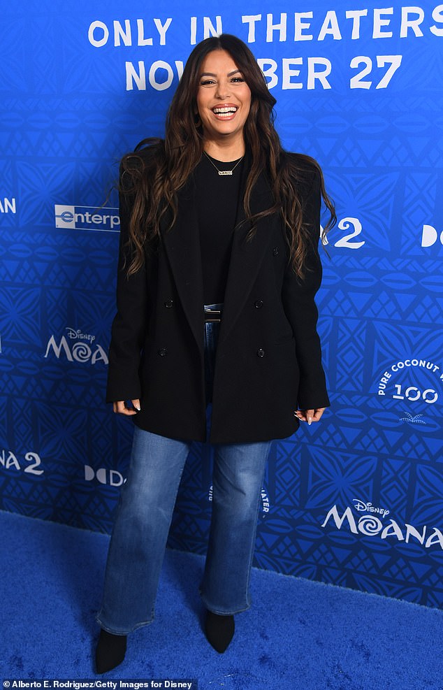 Eva covered her petite 5ft 2in frame in a boxy black jacket over a matching top, straight-leg jeans and black ankle boots curated by stylist Maeve Reilly.