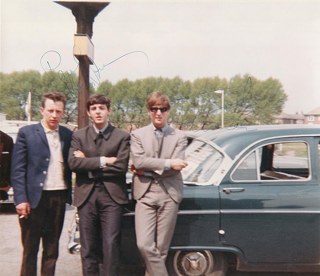 In the presence of greatness: This photo shows our reader Simon's father with Paul and John.