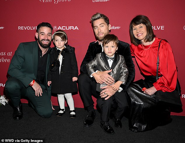 She made the event a family affair when she showed up with her husband Michael Turchin, her three-year-old twins Violet and Alexander, and her mother Diane Bass.