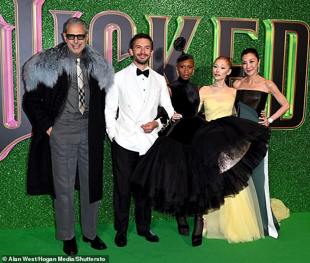 Meanwhile, Michelle Yeoh and Jeff Goldblum, who play Madame Morrible and the Wizard, respectively, earn $2 million each; Pictured left to right: Jeff, Jonathan Bailey, Cynthia, Ariana and Michelle in London.