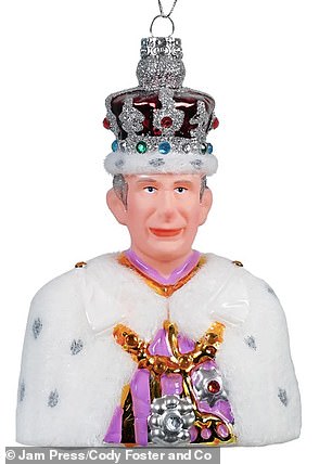 The King's bauble shines in his coronation outfit