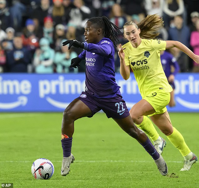 Banda, seen playing for Orlando Pride and passing Washington Spirit's Tara McKeown last Saturday, thanked voters, her family and her teammates for helping her win the BBC award.