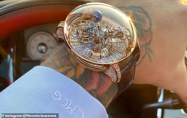 McGregor dons a $1.3 million Jacob & Co Astronomia Tourbillon Baguette watch, which features 342 baguette-cut diamonds invisibly set on the dial and 80 diamonds on the lugs.