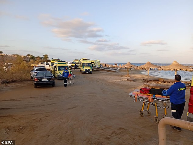 Doctors wait for possible survivors after a ship sank in a port in Marsa Alam, Egypt's Red Sea governorate, on November 25, 2024.