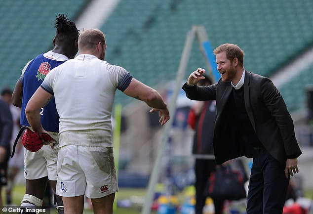 Prince Harry jokes with James Haskell during a visit to Twickenham Stadium in February 2018