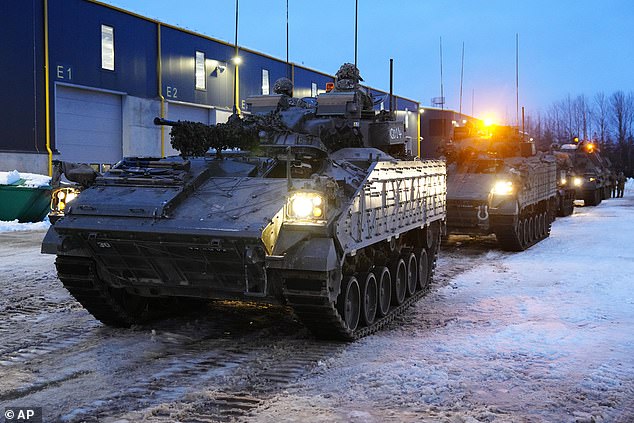 British armored vehicles prepare to move at the Tapa military camp in Estonia, Thursday, January 19, 2023.