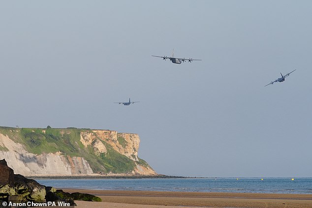 Military aircraft fly over Arromanches beach in Normandy as they fly over the northern coast of France to mark the 80th anniversary of D-Day in June.