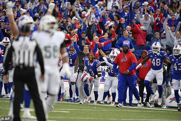 Bills players react after kicker Tyler Bass kicks the game-winning field goal against Miami