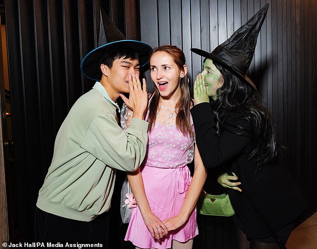 Out of excitement for the 'Wicked' movie, fans dressed in elaborate costumes went to theaters across the country