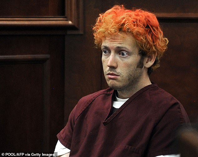 James E. Holmes appeared in court after raining bullets through a Colorado theater (pictured). Commenters on Jamie's TikTok pointed to the 'Black Knight' shooting to explain why Kaylee had to remove her green face paint