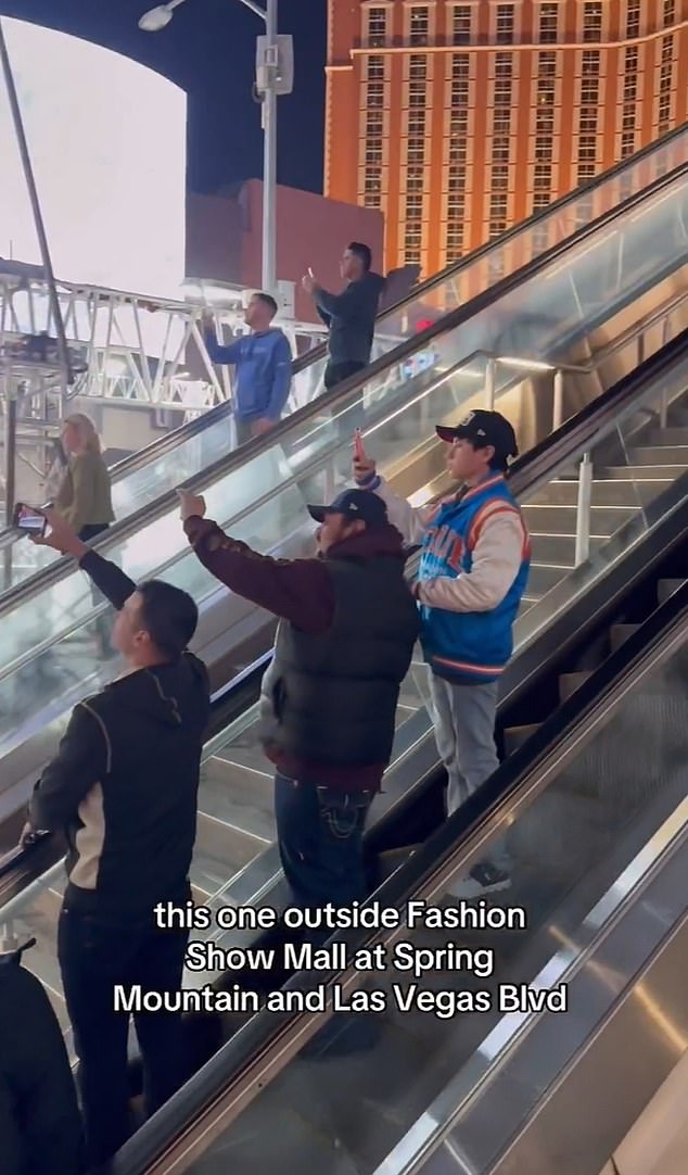 Savvy F1 fans found a solution; climbing an escalator to catch a glimpse of the race, and a funny fan uploaded a video to social media