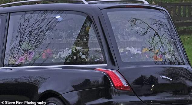 Flowers on the coffin outside Vinters Park Crematorium ahead of today's funeral