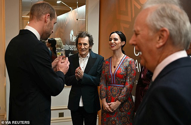 His Royal Highness was joined by celebrities including Mark Knopfler and Ronnie and Sally Wood before the ceremony, with whom he was seen having a lively conversation.