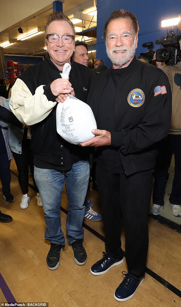 He was joined by actor and comedian Tom Arnold, 65, at the youth centre, and the two posed for photographs together.