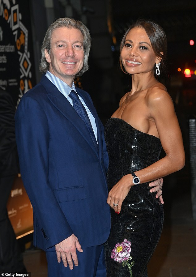 Emma looked radiant in a sparkling dress as she walked the red carpet alongside her husband, Ceawlin Thynn, Viscount Weymouth (left)