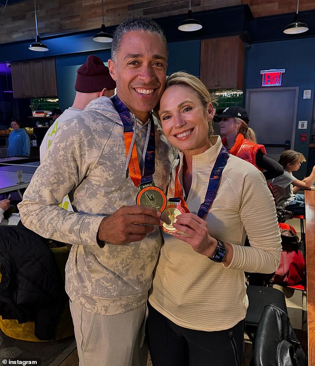 Amy posted on Instagram a photo of her and TJ posing with their medals