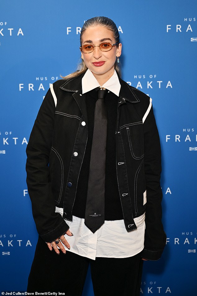 DJ Harriet Rose showed off her unique fashion sense in a white shirt under a gray sweater and a black denim jacket.