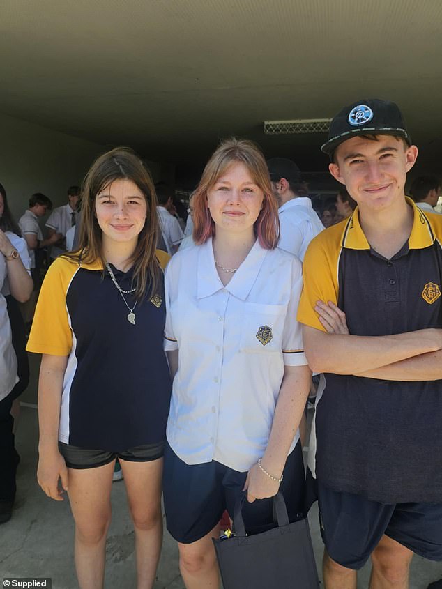 Beau appears in the photo with his sisters.