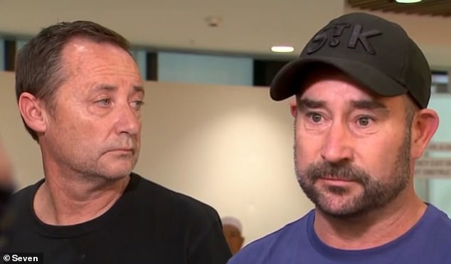 The parents of the two girls, Shaun Bowles (left) and Mark Jones (right), at Melbourne airport after bringing their daughters' bodies home.