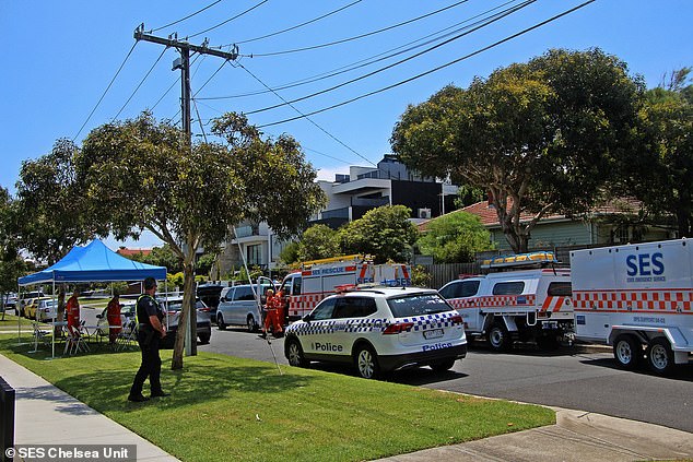 The man and woman were discovered at a property on James Sreet in Mordialloc, in Melbourne's south-east (Police and SES crews appear at the scene)