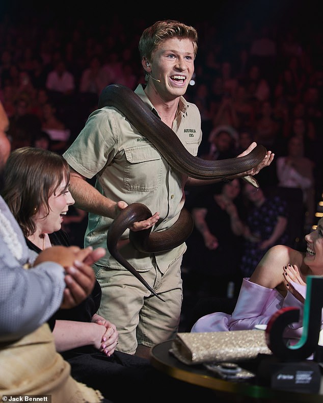 The famous conservationist, who hosted the event at the Hordern Pavillion, made guests look worried when he pulled out a huge non-venomous snake and showed it to the crowd.