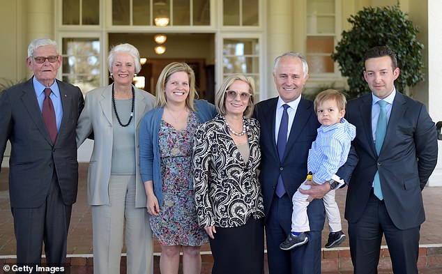 Tom Hughes' daughter Lucy Turnbull, wife of former Prime Minister Malcolm Turnbull, said goodbye to her father on Thursday. Pictured are Lucy and Malcolm Turnbull with their family and Mr and Mrs Hughes outside Government House in 2015.