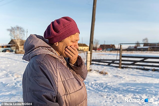 A devastated neighbor talks to a local journalist about the 'pretty as a doll' victim Shevelyova