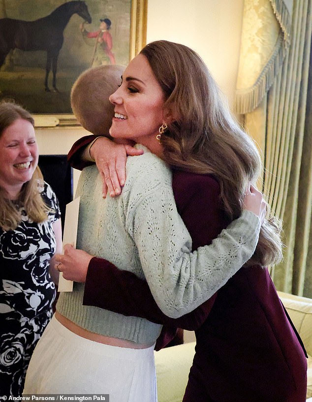 The Princess of Wales was pictured sharing a tender hug with Liz when they met at Windsor Castle in October and bonding over their shared love of photography.