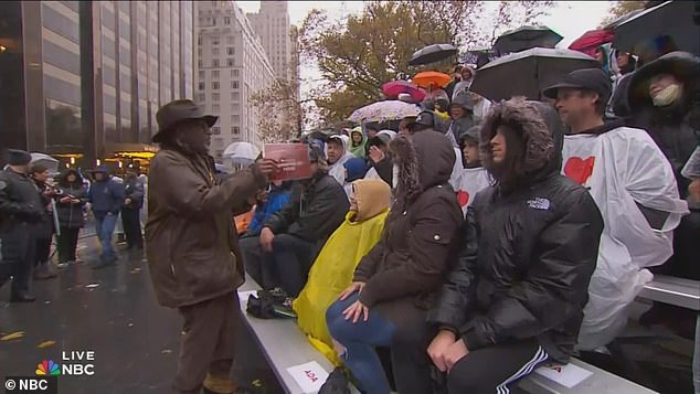 Macy's Thanksgiving Day Parade started with pouring rain and frigid temperatures driving the crowd away