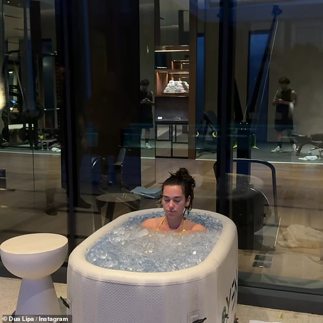 But Dua also showed the impact of her busy and energetic schedule, sharing a clip of her relaxing in an ice bath to soothe her sore muscles.