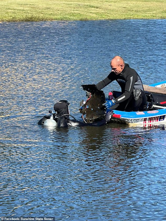 Sunshine State Sonar divers pull car parts from depths of pond